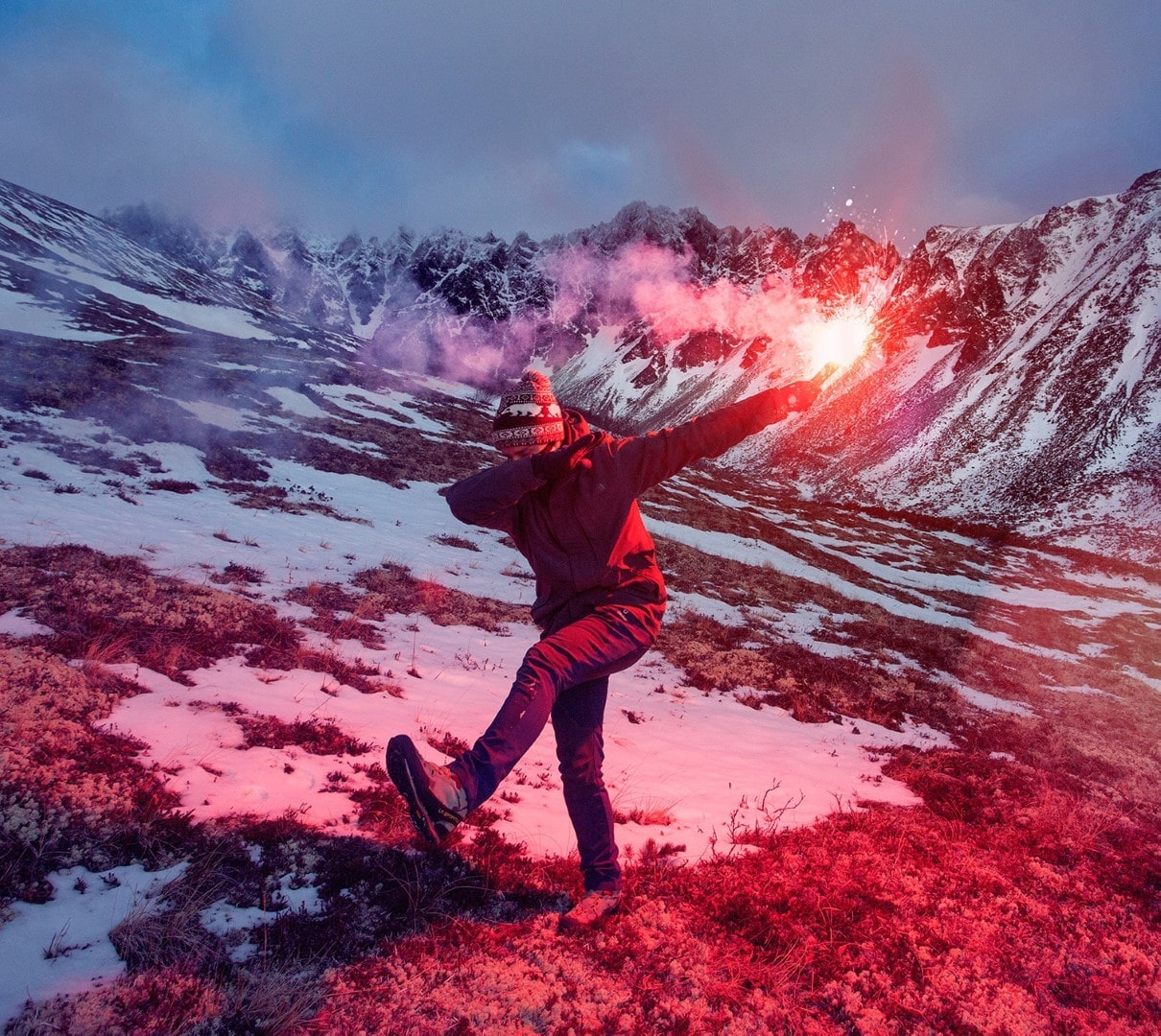 Photograph of One Person standing on the mountaintop